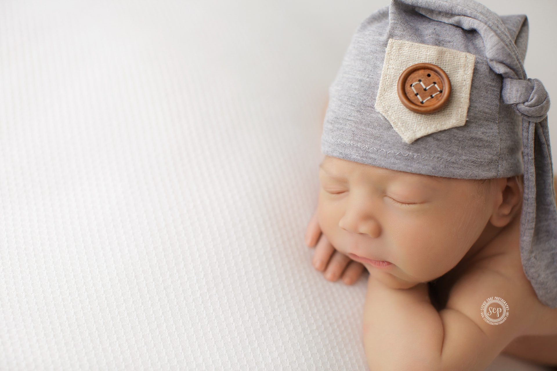 cute hat prop for baby boy newborn photos- Orange County Newborn Photographer