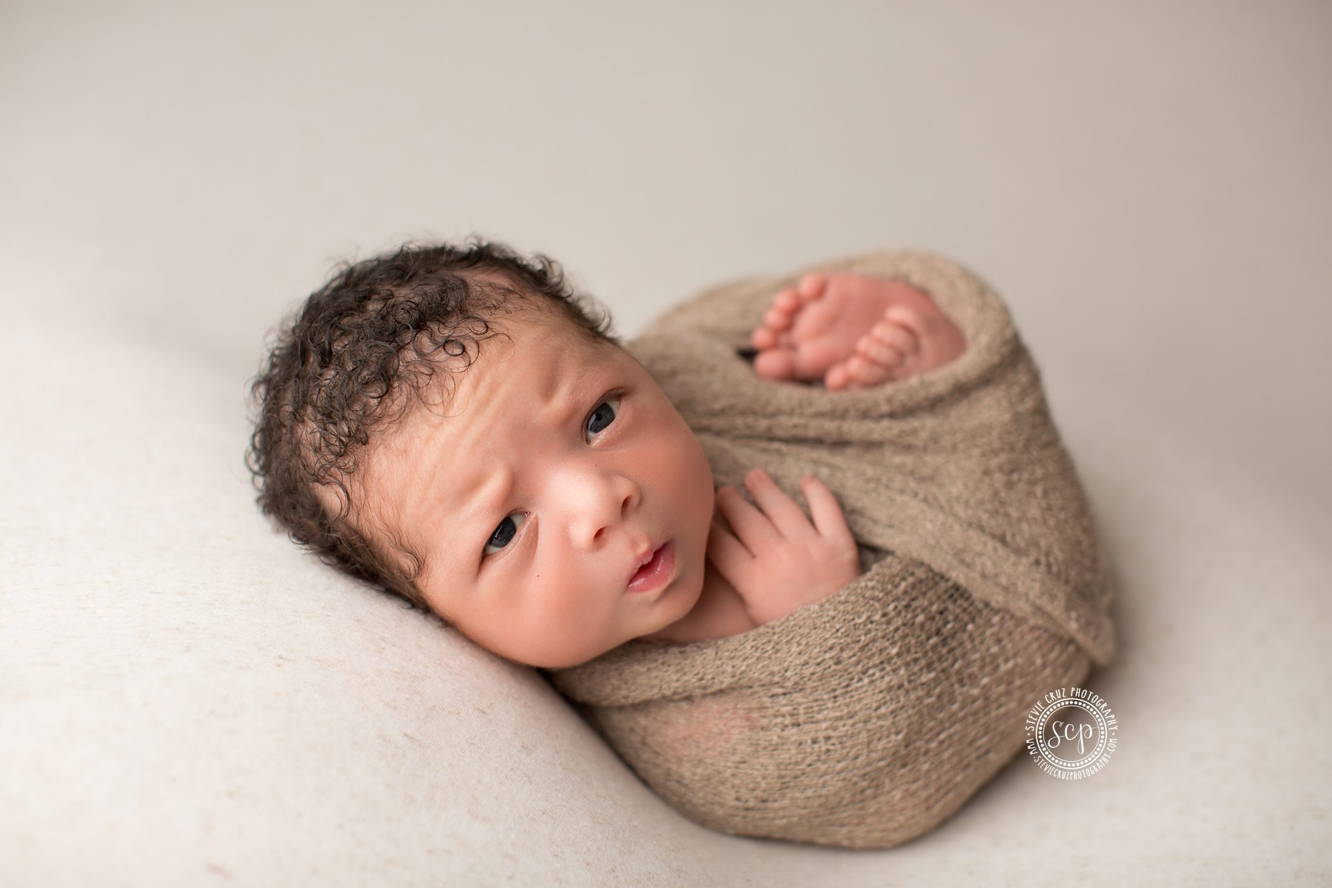 how cute is this newborn baby boy during his photo shoot? Captured by Orange county's best newborn photographer 