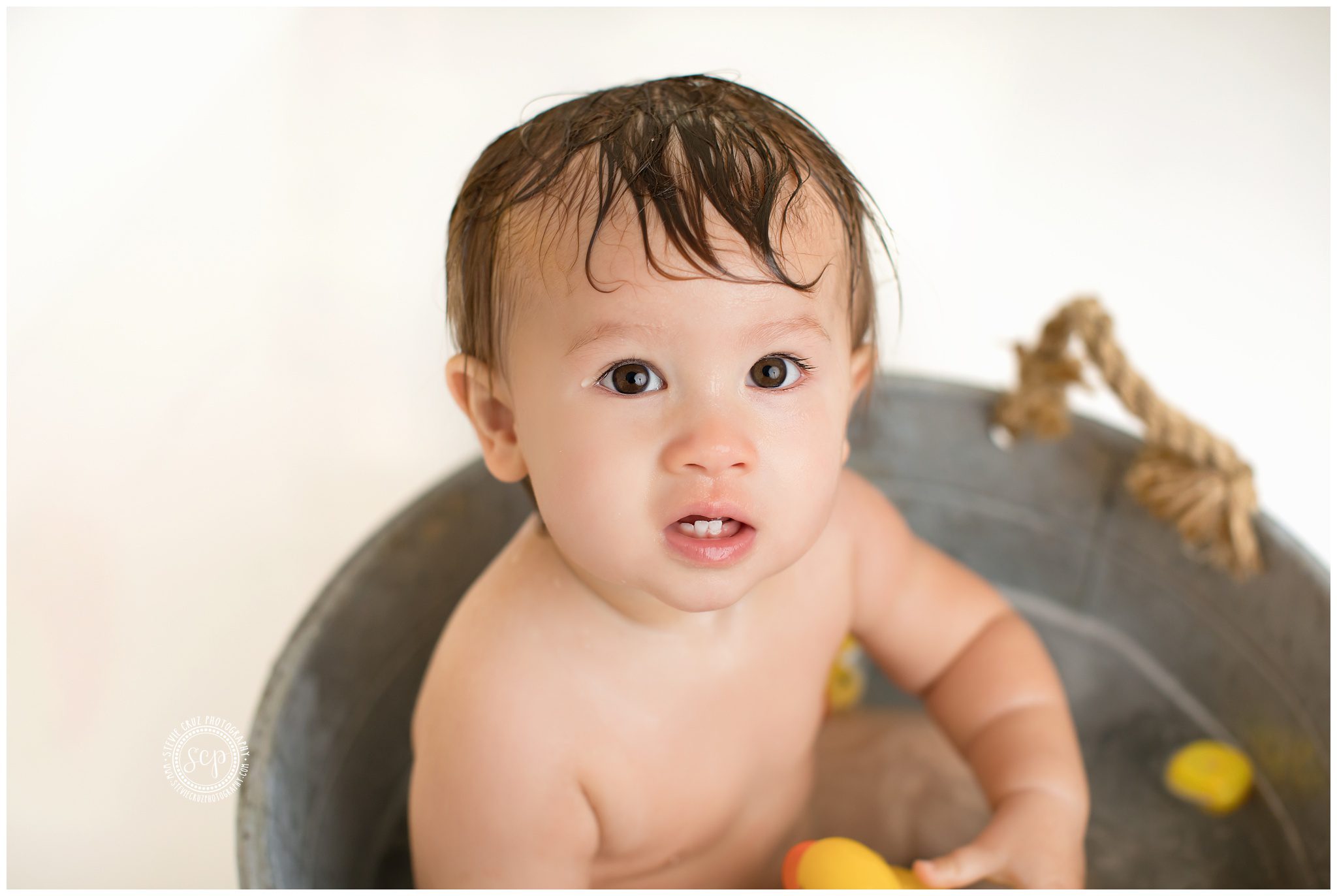 First there was a cake smash then there was bath time, rubber ducky and all. Photos by Stevie Cruz Photography